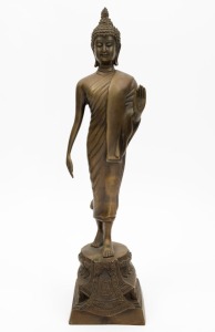 A Thai walking Buddha statue, cast bronze, 20th century, 39cm high