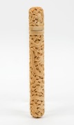 An antique Cantonese carved ivory needle case with fitted lid, containing eight ivory needles. 19th century, ​​​​​​​16cm high - 2