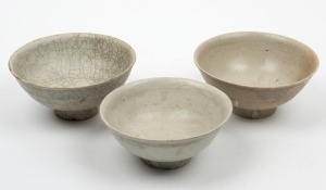 Three antique Chinese shipwreck porcelain bowls, Ming Dynasty, ​​​​​​​the largest 8cm high, 16.5cm diameter