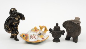 An antique Japanese bronze statue with gilded highlights, a Chinese porcelain teapot, a miniature lidded bronze pot, and a pottery vessel of unknown origin, (4 items), the statue13.5cm high