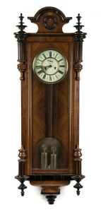 Vienna regulator twin weight wall clock in walnut case with roman numerals and subsidiary dial, 19th century, 115cm high