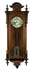 Vienna regulator twin weight wall clock in walnut case with roman numerals and subsidiary dial, 19th century, 115cm high 