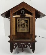 An antique cuckoo wall clock with silvered dial and Roman numerals, early 20th century, 58cm high - 2