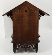 An antique cuckoo wall clock with silvered dial and Roman numerals, early 20th century, 58cm high - 4