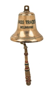 SHIP'S BELL from the "BASS TRADER, MELBOURNE", with impressively worked rope handle, 20th century. The Bass Trader was built in Newcastle and launched in 1961 and spent her days plying the Bass Strait route from Tasmania to Melbourne, the bell 20cm high