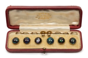 A fine set of boulder opal buttons and studs, mounted in 9ct yellow gold, housed in original plush box, circa 1900, ​​​​​​​the box 12.5cm wide