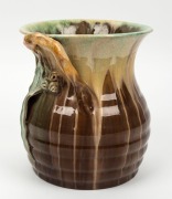 REMUED pottery vase with applied gumnuts and leave, glazed in green and brown, incised "Remued, Hand Made, 191/8M", 21cm high - 2