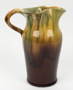 REMUED pottery vase with applied gumnuts and leaves, glazed in green and brown, incised "Remued, Hand Made, 133M", 24cm high - 3