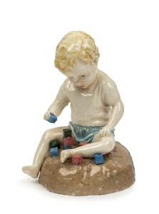 BERYL AULT pottery statue of a child with building blocks, incised "Beryl Ault. No.4. Limited to 25 copies", 11cm high