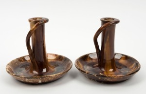 McHUGH pair of brown glazed pottery candlesticks, incised "McHugh, Tasmania", 13cm high