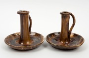 McHUGH pair of brown glazed pottery candlesticks, incised "McHugh, Tasmania", 13cm high - 2