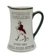 CALYX "JOHNNIE WALKER, Born 1820, Still Going Strong" antique ceramic jug, circa 1920, rare. Stamped "CALYX, PERTH W.A." with black swan, 18.5cm high