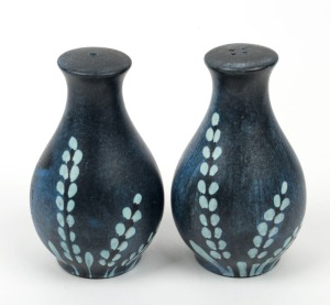 McLAREN pair of blue glazed condiments, incised "McLaren". 12.5cm high.