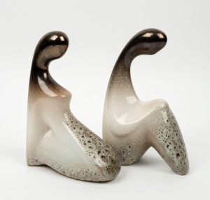 ELLIS pair of figural pottery bookends, 24cm high.