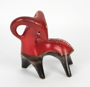 ELLIS red and brown glazed ram statue, 21cm high.