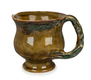 CRUFFEL porcelain jug with wind swept tree handle, 12cm high, 15cm wide