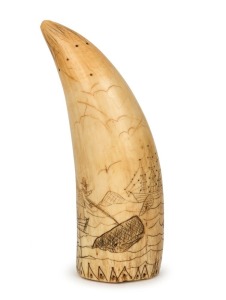 A scrimshaw whale's tooth adorned with naive whaling scene, 15cm high