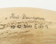 "WHALING IN TWOFOLD BAY 1828-1930" scrimshaw whale's tooth depicting Eden's Twofold Bay with whaling scene, signed "Rene Davidson, Eden 13-12-2003", 18cm high - 2