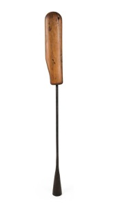 An antique toggle harpoon with period huon pine tip guard, 19th century, 70cm long overall