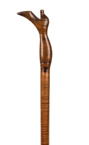 An antique Australian walking stick with shoe handle, fiddleback blackwood shaft with musk handle and Australian native timber mirrored dovetail keys, plus original brass ferule, 19th century, 94cm high