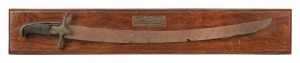 COLONIAL OFFICER'S SWORD relic condition, mounted on board with plaque "Colonial Officer's Sword circa 1838, Recovered From Wall During Renovations Launceston, 1959", the sword 74cm wide