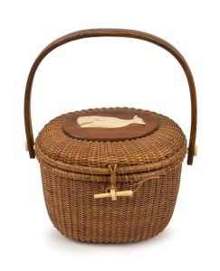 NANTUCKET LIGHTSHIP BASKET with carved whale decoration, signed on the base "FARNUM", early 20th century, ​​​​​​​31cm high