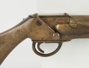 A whaler's antique bomb lance gun in bronze with skeletonised stock, 19th century, 94cm long - 2