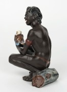 DARBYSHIRE&nbsp;ceramic statue of a crouching Aboriginal man holding a kookaburra, rare, impressed factory mark to base, 16cm high - 3