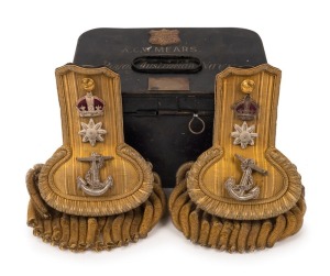 ROYAL AUSTRALIAN NAVY pair of officer's epaulettes in original black Japanned metal box, with ownership detail " A.C.W. MEARS ", with accompanying service record, ​​​​​​​the box 24cm wide.