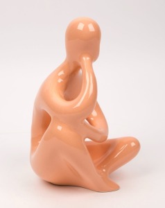 ELLIS "Thinker" peach glazed pottery statue, 25cm high.