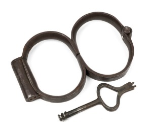 Convict "Plug 8" handcuffs with original key, 19th century