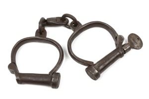 HIATT antique handcuffs with original screw-key, 19th century, 24cm across overall