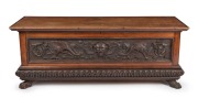 An unusual Australian Arts & Crafts blanket box, blackwood and kauri pine, carved with dragons and gothic motifs, 19th/20th century, ​​​​​​​an imposing 62cm high, 164cm wide, 54cm deep