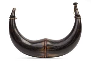 A rare Australian double powder horn, Sydney origin,19th century, engraved with "Government House Parramatta", "Hyde Park Convict Barracks", "Australian Station Dromedary", English Coat-of-Arms, kookaburra and Masonic symbols, 29cm across