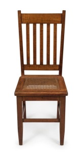 A fine Australian fiddleback blackwood chair with cane seat, possibly the work of HARRY GOLDMAN of Melbourne, circa 1920s, ​​​​​​​91cm high