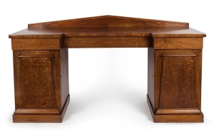 A Colonial Australian cedar twin pedestal sideboard with Palladian back, handsomely selected cuts of cedar to the paneled doors, Tasmanian origin, circa 1835. Purported to have been made for "Chiswick", Ross, Tasmania. With accompanying Kent & Kent docume