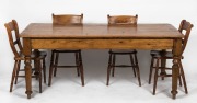 An antique Australian farmhouse kitchen table, kauri pine with three plank celery pine top, South Australian origin, circa 1860s, together with an attractive set of six beech and hardwood cottage chairs, (7 items), the table 74cm high, 183cm wide, 83cm de