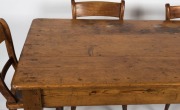 An antique Australian farmhouse kitchen table, kauri pine with three plank celery pine top, South Australian origin, circa 1860s, together with an attractive set of six beech and hardwood cottage chairs, (7 items), the table 74cm high, 183cm wide, 83cm de - 2