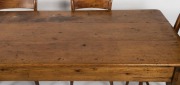 An antique Australian farmhouse kitchen table, kauri pine with three plank celery pine top, South Australian origin, circa 1860s, together with an attractive set of six beech and hardwood cottage chairs, (7 items), the table 74cm high, 183cm wide, 83cm de - 3