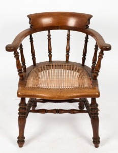 An antique Australian captain's chair, blackwood and Queensland walnut, 19th century, 64cm across the arms.