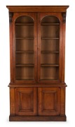 An antique Australian cedar library bookcase, Melbourne origin, circa 1870, 235cm high, 126cm wide, 50cm deep
