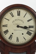 An antique drop-dial wall clock with spring driven movement, with retailer's details on the dial "J.R. WEBSTER 103 SWANSTON ST. MELBOURNE", 19th century. Note: American movement in English mahogany case. 53cm high overall with 12" dial - 2