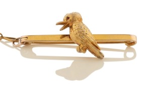 WILLIS & SONS of Melbourne 9ct yellow gold kookaburra bar brooch with ruby eye, 19th century, stamped "9.W." with unicorn mark, 4.5cm, 9.6 grams