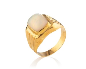 An 18ct gold signet ring with impressive solid polished opal, stamped "750", ​​​​​​​8 grams total