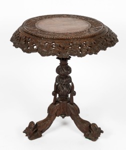 Anglo-Indian ornately-carved padouk tilt-top table, 19th century. 73cm high, 67cm wide.