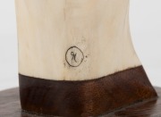 "A CHART OF THE GULF STREAM" scrimshaw whale bone carved into the form of a whale's tail, mounted on blackwood, 21cm high - 2