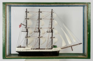 An Australian folk art scratch-built model ship in case, early - mid 20th century, 59cm high, 91cm wide, 18cm deep.