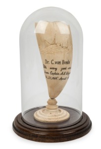 Whale's tooth ornament on stand in glass dome, ​​​​​​​titled "Dr. C. Von Bonde, With Every Good Wish From Captain A. N. Solyanik. F/S Slava, April 1952", 22cm high, 26cm high overall