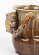 REMUED brown and cream glazed pottery vase with applied koala and branch handle, incised "Remued, 194/4", 11cm high - 2