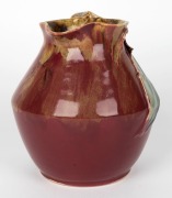 REMUED pottery vase with applied gumnuts, branch handle and leaf, glazed in rare deep pink and green colourway, incised "Remued", 16cm high - 2